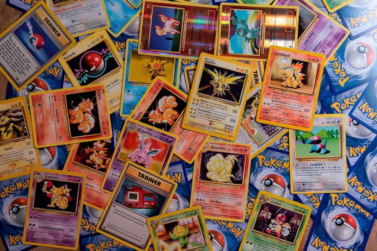 Pokémon 100 Pokemon Card Lot with Legendary Ultra Rare 0.4 cubic inches