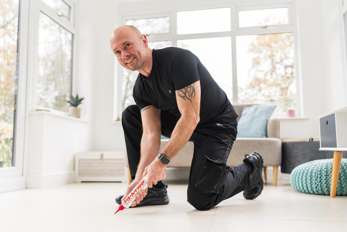 The  Fix-A-Floor Squeezy All-in-One Repair Adhesive for Loose, White